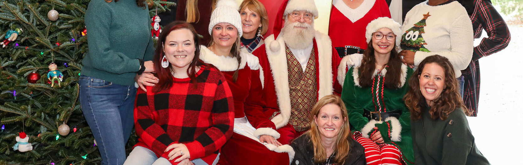 Committee and Volunteers photo with Santa